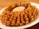Cebolas Outback: veja preço no restaurante e como fazer em casa